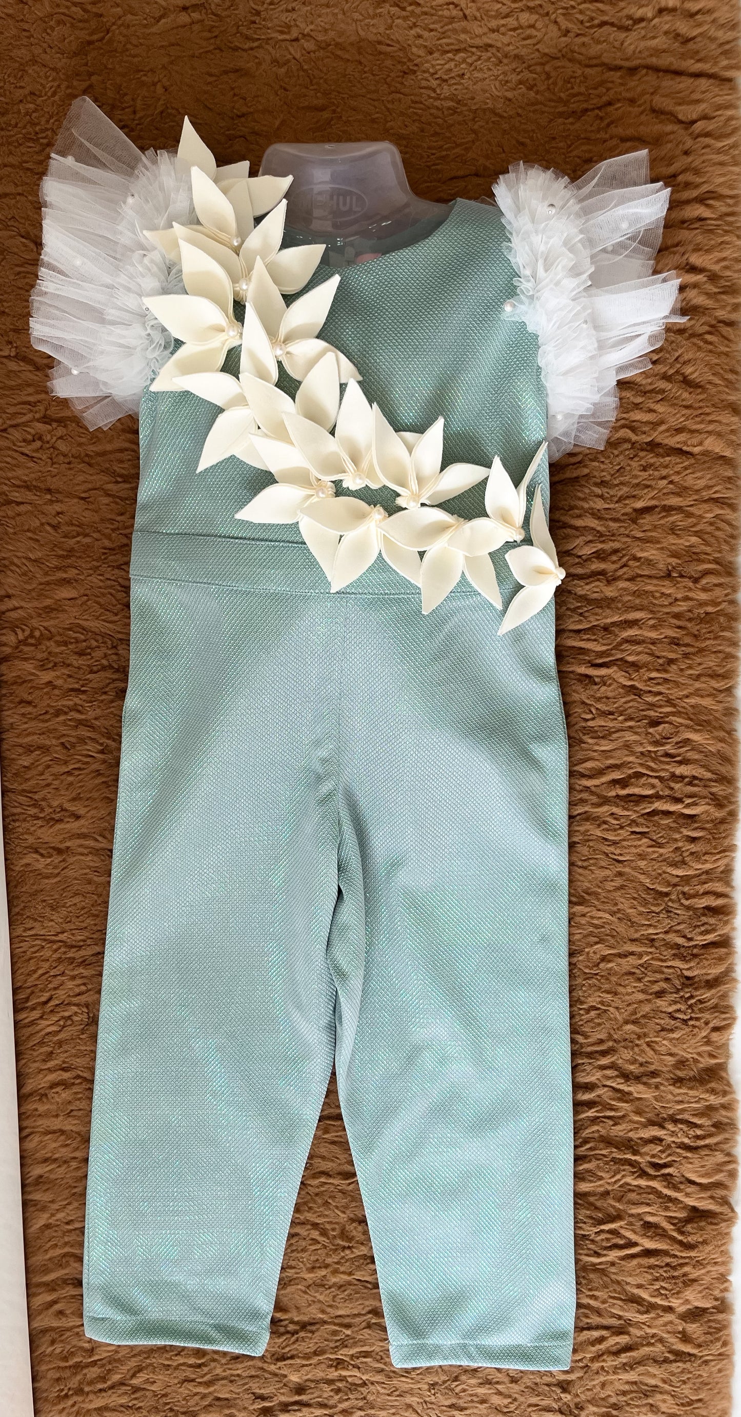 Jumpsuit With White petals In Blue Colour.